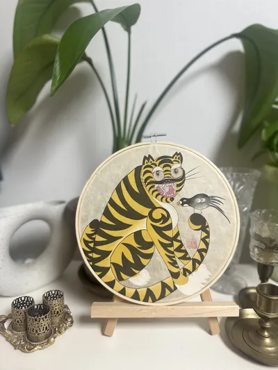 Finished tiger painting on a small easel